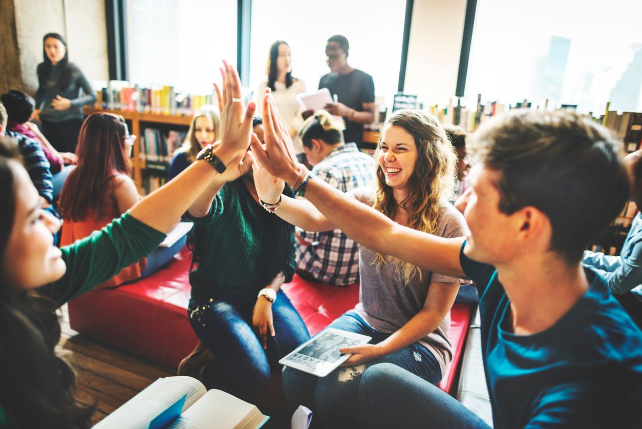 Chinese learners giving five together